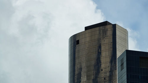 Low angle view of modern building against sky