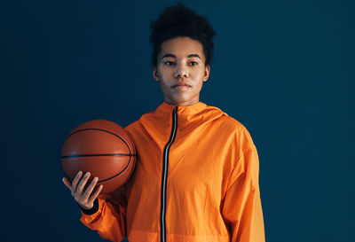 Young man playing basketball