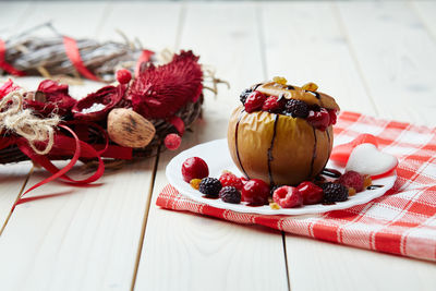 Close-up of fruits in plate on table