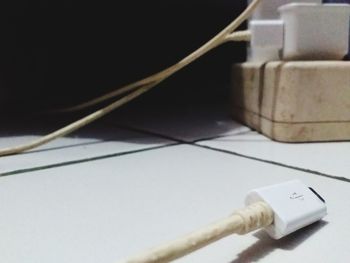 Close-up of mobile phone on table