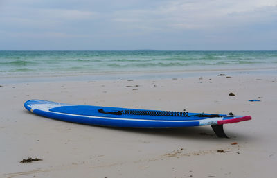 Surfboard by the beach