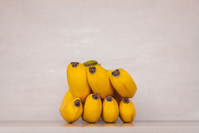 Close-up of yellow fruits on table