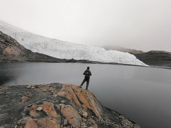 Man in front of pastoruri glacier in peru