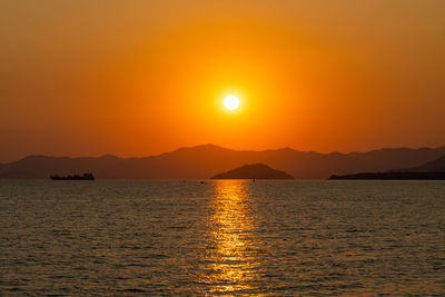 Scenic view of sea against sky during sunset