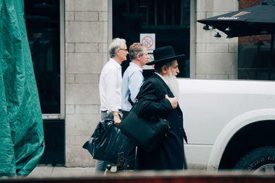 People standing outside building