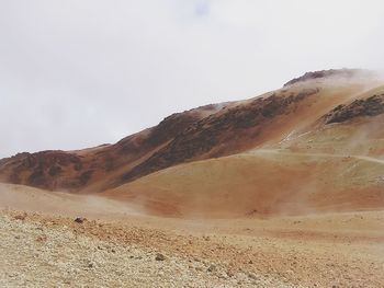 Scenic view of desert against sky