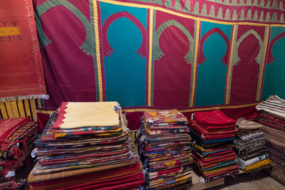 Stack of multi colored for sale at market stall