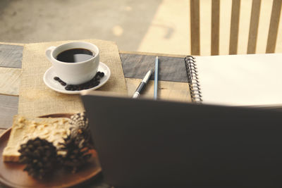 High angle view of coffee cup on table