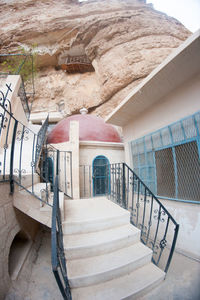 High angle view of staircase leading towards building