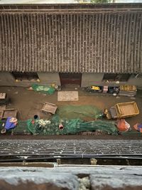 High angle view of people working on railroad track