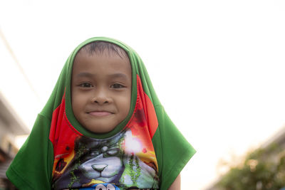 Close-up portrait of smiling boy