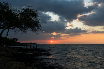 Scenic view of sea against sky at sunset