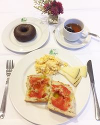 Close-up of breakfast served on table