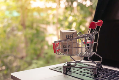 Close-up of red toy in basket on table