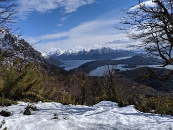 Scenic view of snowcapped mountains against sky