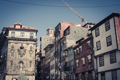 Low angle view of buildings against clear sky