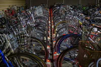 Stack of bicycles in parking lot