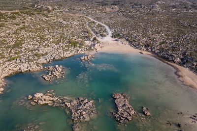 High angle view of rocks in sea