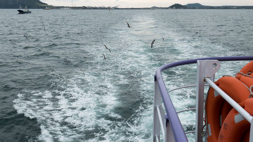 Boats sailing in sea