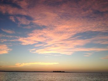 Scenic view of sea at sunset