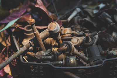 Old ball joint, rusted steel nut.