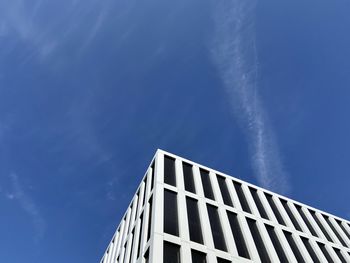 Low angle view of building against blue sky