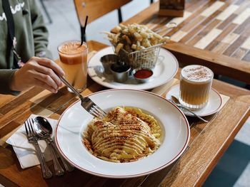 High angle view of breakfast served on table