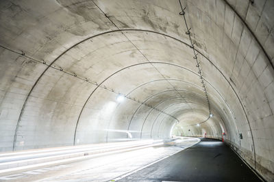 Low angle view of empty tunnel