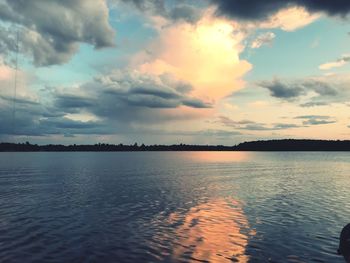 Scenic view of sea against sky at sunset