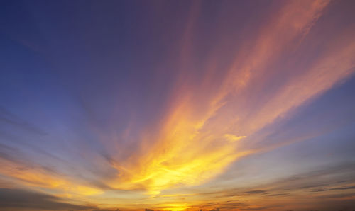 Low angle view of dramatic sky during sunset