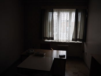 Curtains at window in room at prison