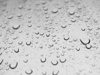 Full frame shot of water drops on sand