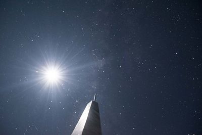 Low angle view of airplane flying in sky