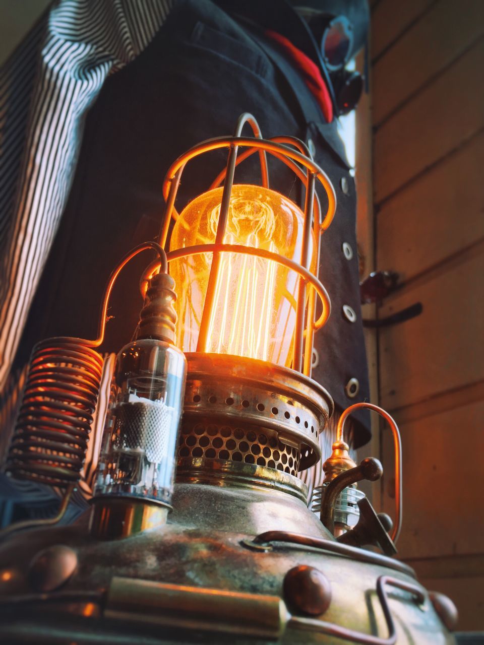 indoors, metal, technology, music, arts culture and entertainment, close-up, illuminated, retro styled, musical instrument, metallic, no people, old-fashioned, musical equipment, machinery, shiny, night, musical instrument string, guitar, low angle view, equipment