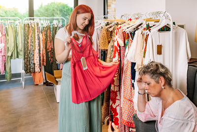 Side view of couple standing in store