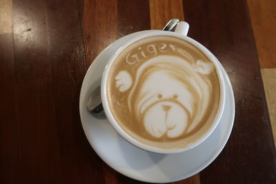 High angle view of cappuccino on table