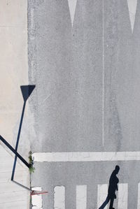 Reflection of woman on wall