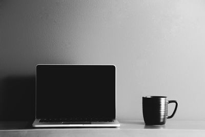 Coffee cup on table