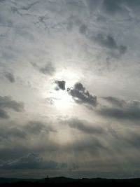 Low angle view of cloudy sky during sunset