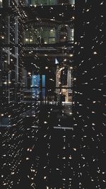 High angle view of illuminated buildings at night