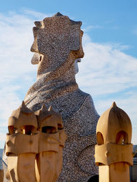 Statue of buddha against sky