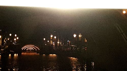 Illuminated street light at night