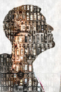 Multiple exposure image of building and man