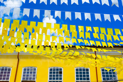 Low angle view of colorful flags