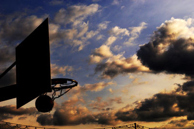 Low angle view of cloudy sky at sunset