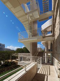 View of buildings against blue sky