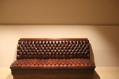 Close-up of food on table against wall