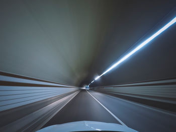 Looking through the car glass at the road tunnel ahead