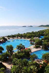 Scenic view of sea against blue sky