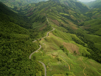 Full frame shot of green mountains